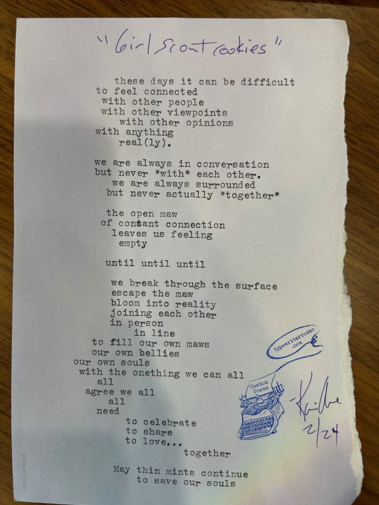 A photo of the typewritten poem on a torn half sheet of light yellow paper.