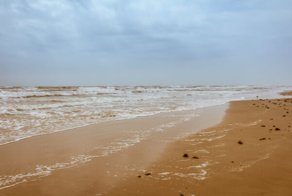 A cloudy sky seen above beach on Padre Island