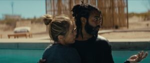 A photo of two people caressing.