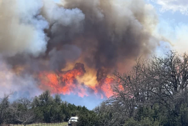 Crews fighting back 9,700-acre grass fire north of Fredericksburg
