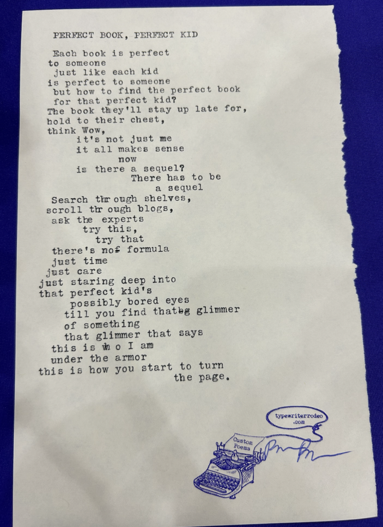 A photo of the typewritten poem on a torn half-sheet of light paper.