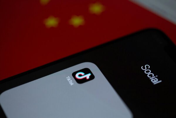 A close-up of the TikTok app icon on a phone