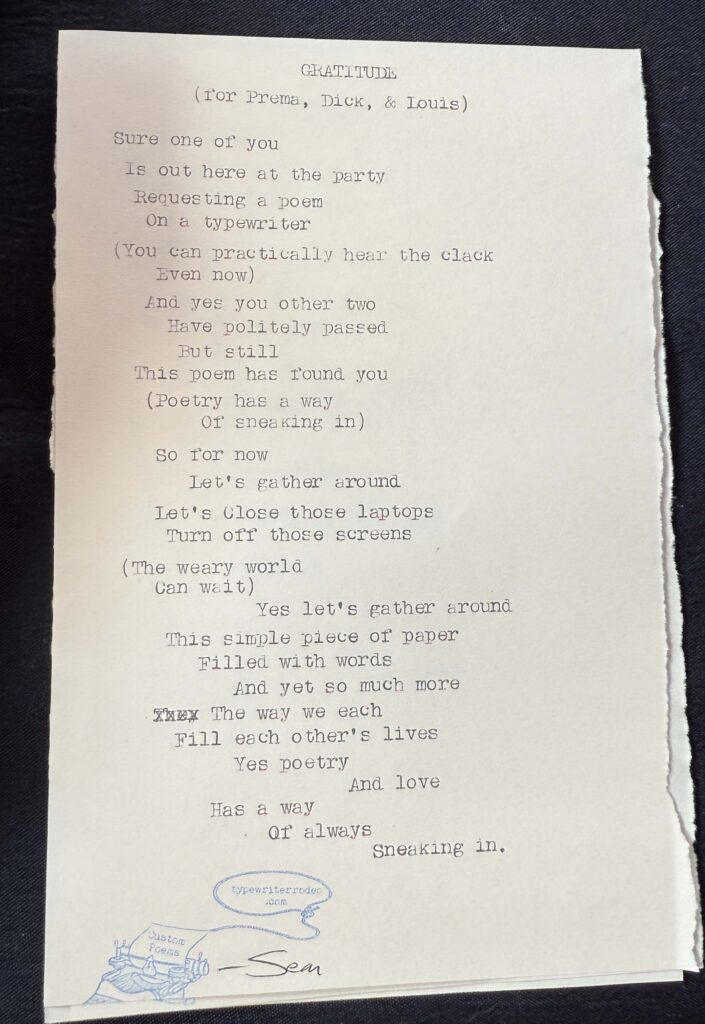 A photo of the typewritten poem on a torn half-sheet of light yellow paper.