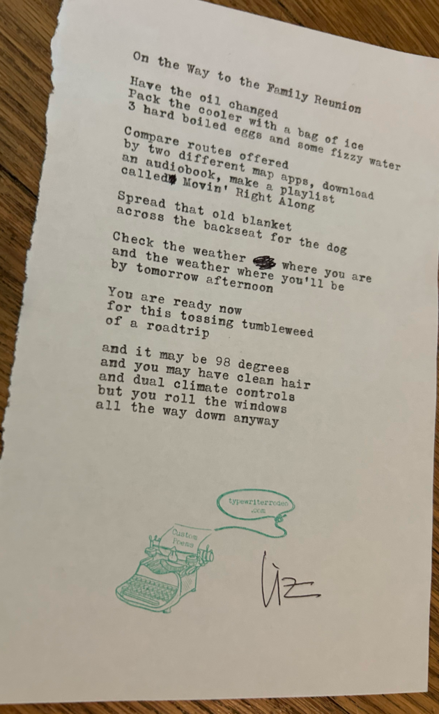A photo of the typewritten poem on a torn half-sheet of light paper.