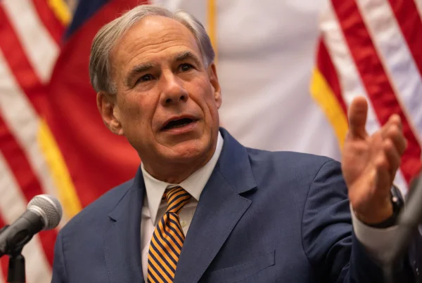 Minnesota sues Gov. Abbott as ICE agent charged in shooting faces possible release in Texas