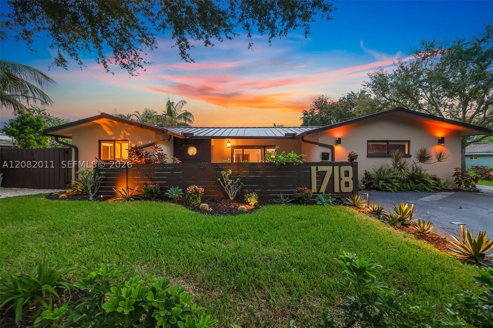 1718 NE 58th St, Fort Lauderdale — front elevation of the single-family home
