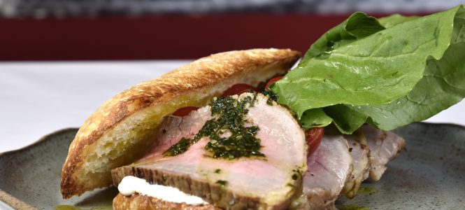 Grilled Pork Tenderloin Sandwiches – Time of the Tailgate beef sandwich with rucula, cherry tomatoes and pesto.