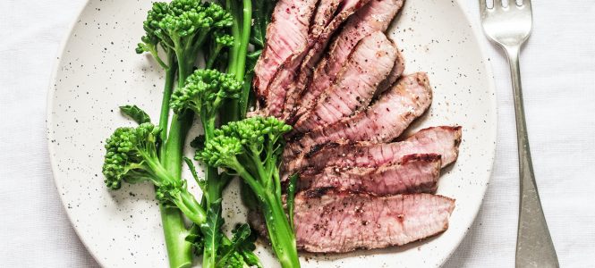 Grilled Beef with Broccoli – Grillin’ in the Spring Series Fitness diet healthy lunch - grilled beef steak and boiled broccoli on a light background, top view