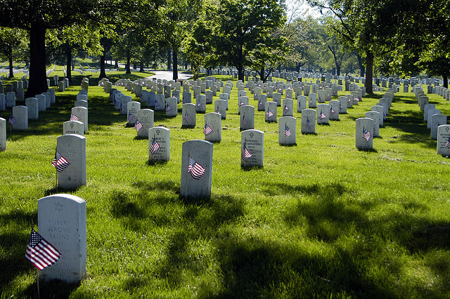 Each marker in Section 60 of Arlington National Cemetery, which holds veterans from Operation Enduring Freedom and Operation Iraqi Freedom, has a flag placed in front of it during the "Flags In" Memorial Day tradition, May 21, 2009. 