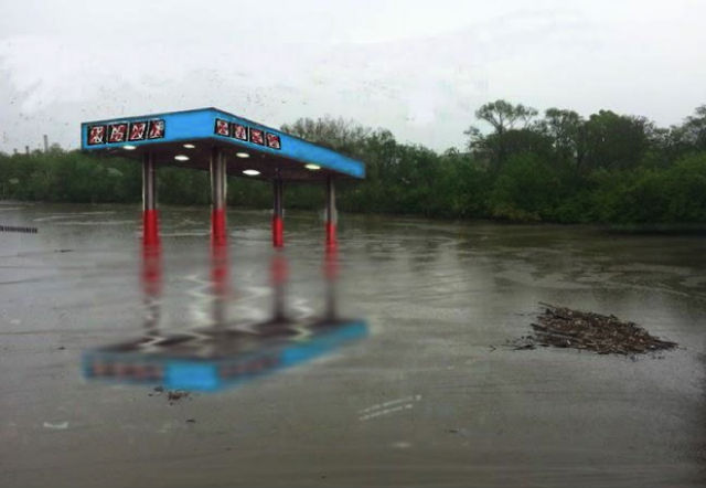 A rendering of Mia Feuer’s proposed public art piece, “Antediluvian," a sunken gas station sculpture in the Anacostia River. 