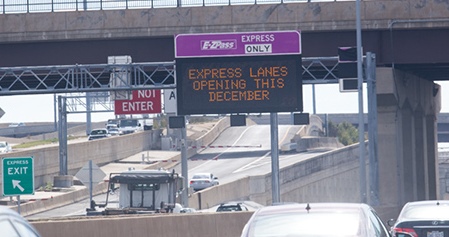 A sign in Springfield advertises the opening of the I-95 Hot Lanes this month.