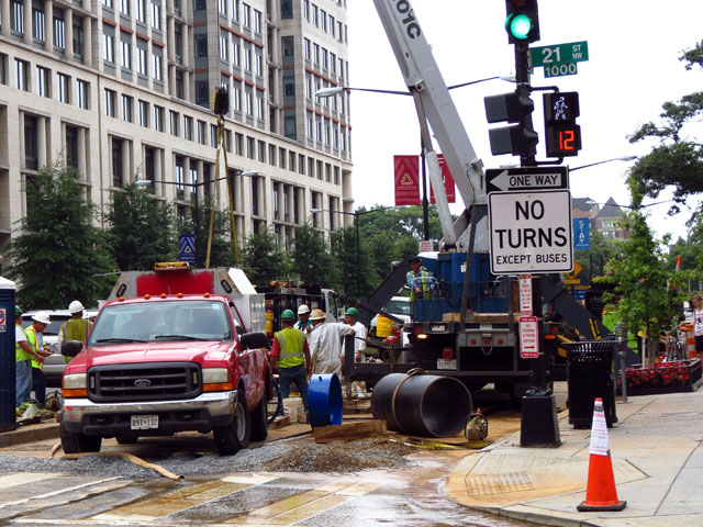 A crew works on water infrastructure near the intersection of 21st and K streets in 2012.