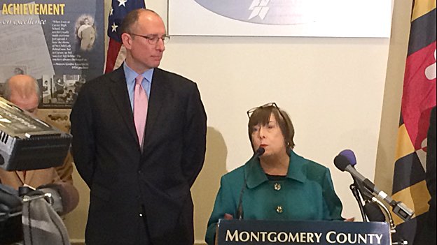 Joshua Starr, left, listens as Montgomery County school board President Patricia O'Neill speaks at a news conference on Feb. 3. Starr announced his plans to resign at the same news conference.