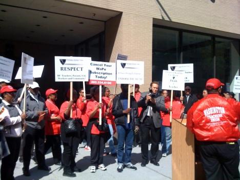 Members of the Washington Teachers' Union protest outside The Washington Post building in Northwest D.C.