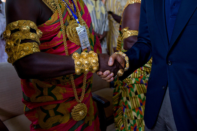 President Barack Obama shakes hands on a 2009 tour of Cape Coast Castle in Ghana.