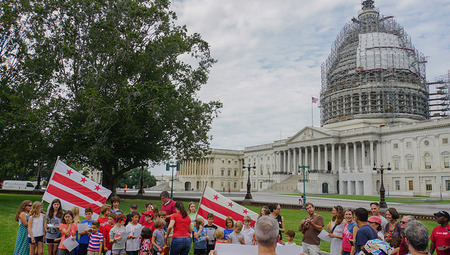 Children sing the John Oliver song in support of D.C. statehood at the U.S. Capitol in August, 