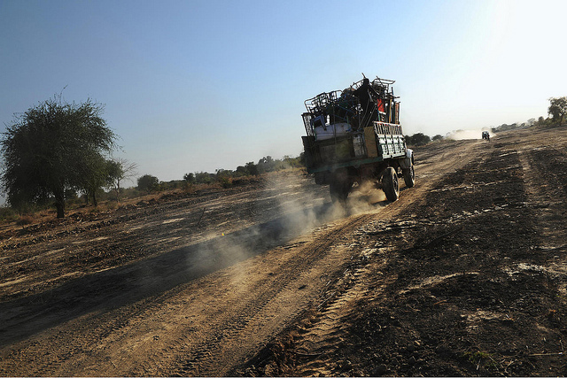 A truck carries the belongings of South Sudanese returnees in the Udhaba/Apada area. Between Dec. 1, 2010 and Jan. 13, 2011, the area saw  the return of 10,000 South Sudanese, with the International Organization for Migration (IOM) registering approximately 50,000 returnees state-wide over the same period.