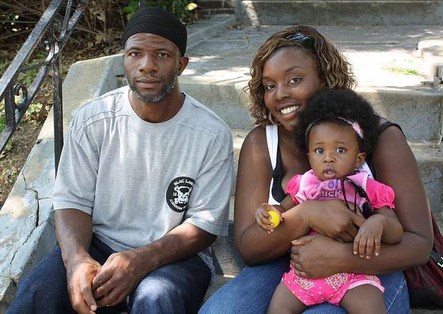 A young family enjoys a block party in Washington, D.C. 