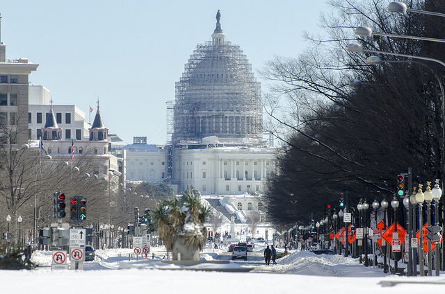 Traffic slowly returns to Pennsylvania Ave January 24, 2016. Approximately 17.8 inches of snow fell on the Washington D.C. metropolitan area.