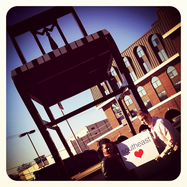 Blogger Nikki Peele (left) and at-large D.C. councilmember candidate David Garber (right) at Anacostia's "Big Chair."