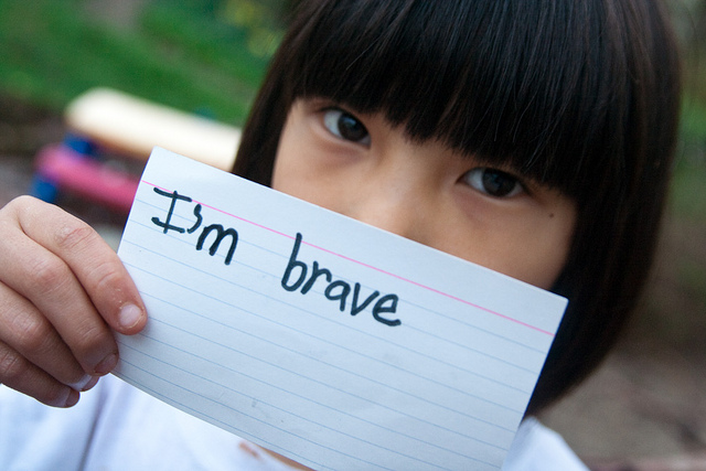 A girl poses in Kent County, Md. for the non-profit, Girls on the Run, an organization seeking to promote "self-respect and healthy living."