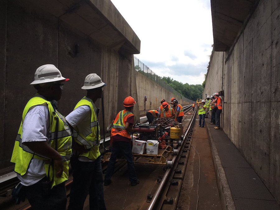 Construction workers along the Orange and Silver between Ballston and East Falls Church.