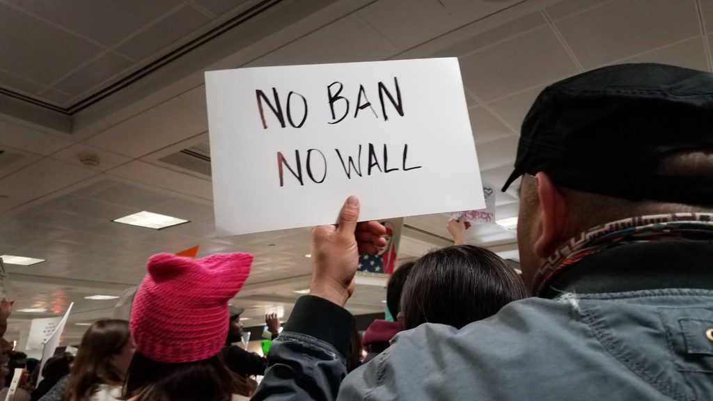 Protestors flocked to Dulles International Airport to protest President Trump's immigration order banning immigration from seven predominately-Muslim countries.