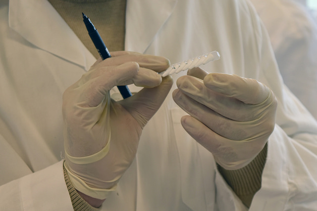 Trainees at the IAEA Seibersdorf Laboratories identify and label samples in a 2016 Zika training course.