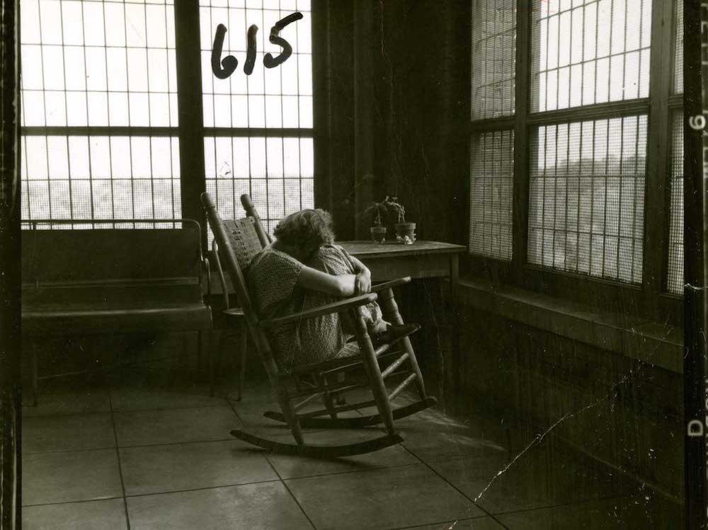 Saint Elizabeths patient on a rocking chair in 1955.