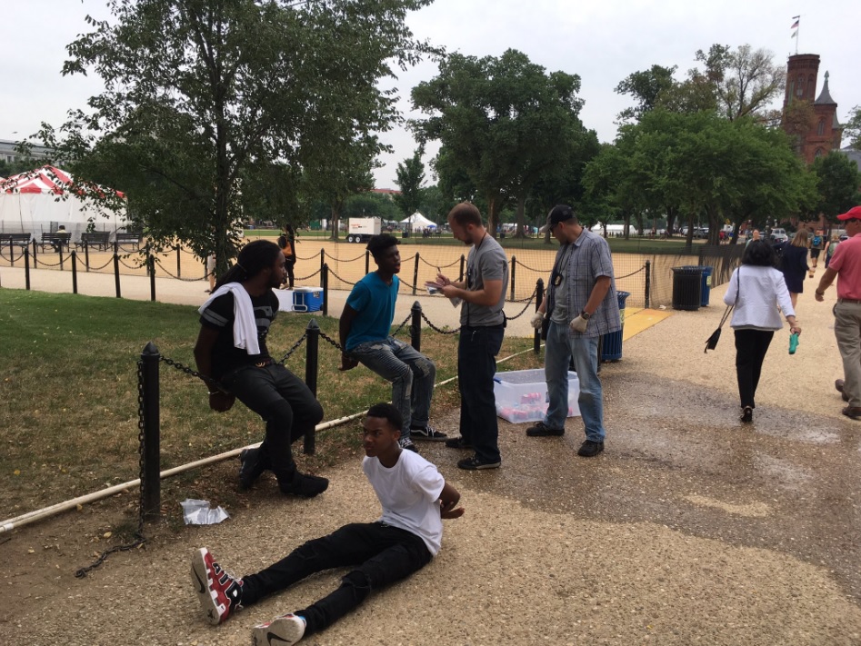 The U.S. Park Police handcuffed young black men on the National Mall  on Friday for selling water bottles. 