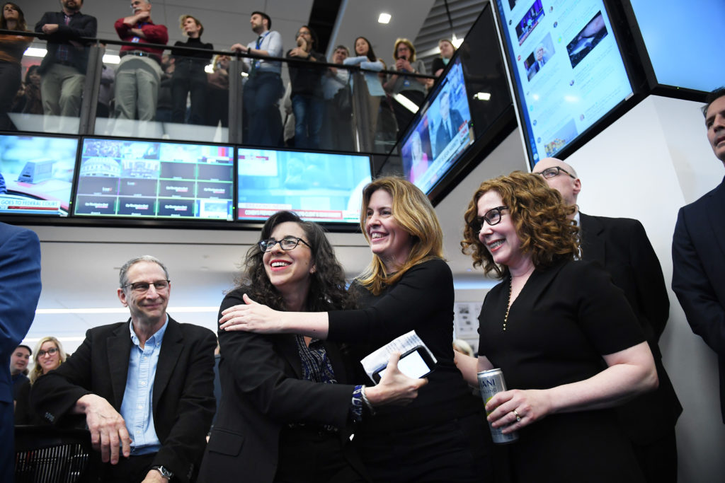 Writers Beth Reinhard, Stephanie McCrummen, and Alice Crites (l-r), celebrate a Pulitzer Prize for Investigative Reporting at The Washington Post in Washington, D.C. on April 16, 2018.