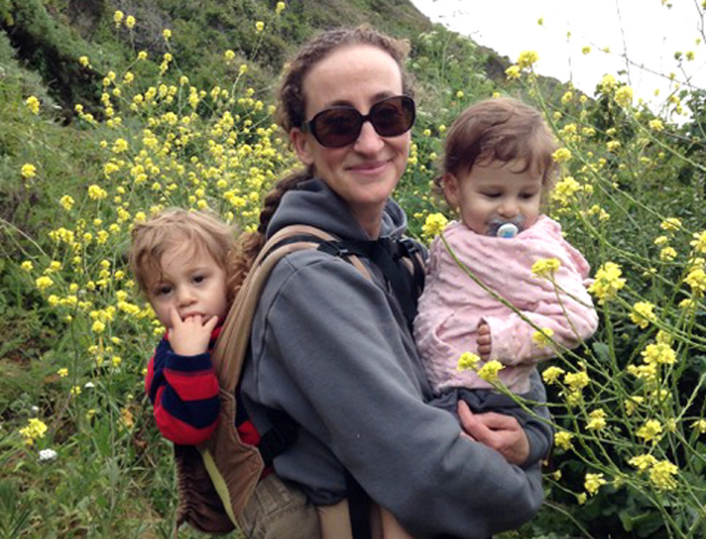 Hilary Klein (center) with her twins Gabriel and Emma.