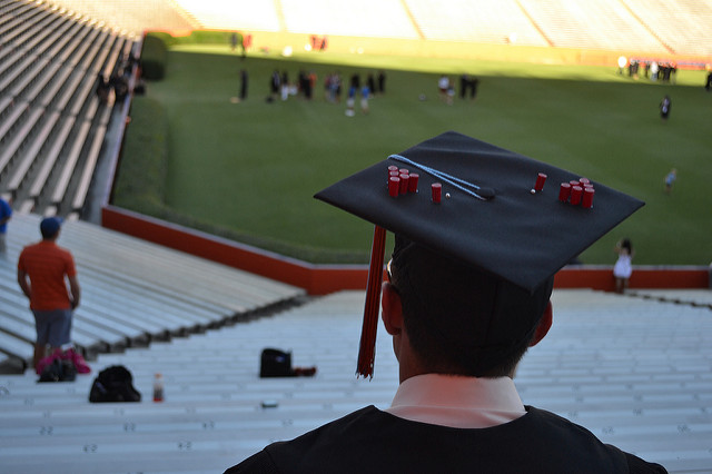 A beer pong-themed motarboard at a high school graduation.