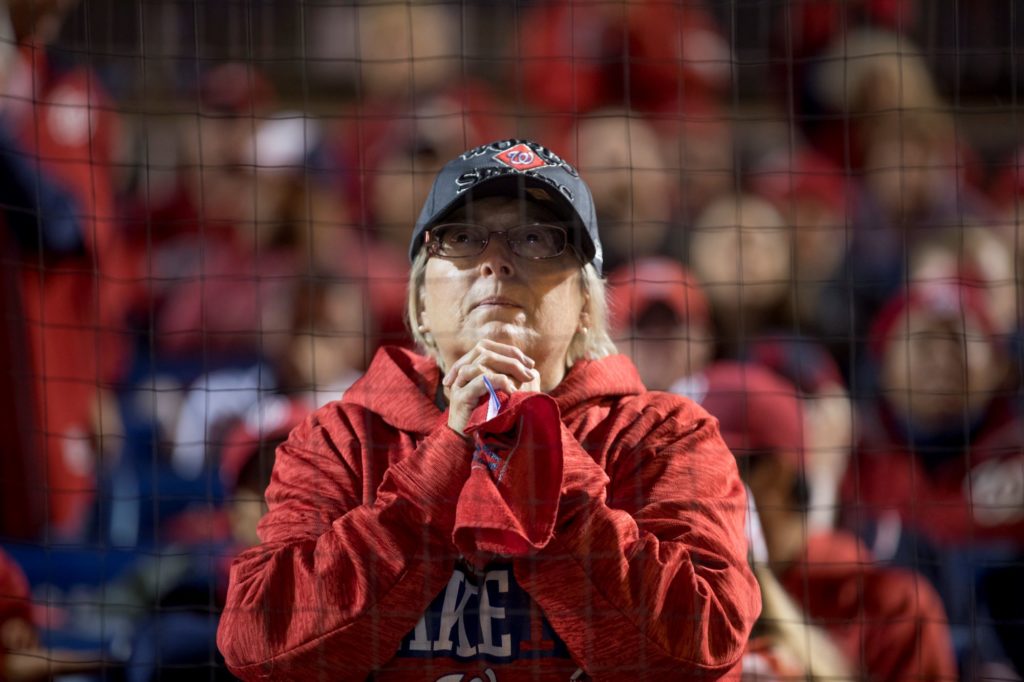 One fan looks on nervously from Nationals Park as the team looks to eke out its first win in the World Series. 