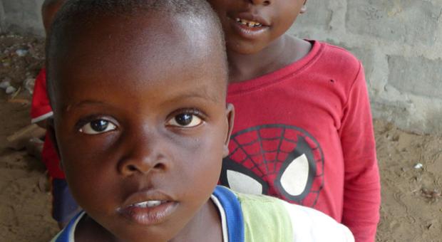 Children on the grounds of the Liberian Institute for Biological Research