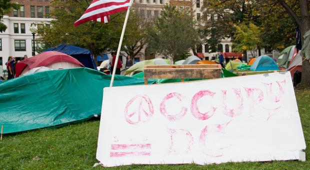 2nd week of Occupy D.C., in McPherson Square. The sign is almost completely faded.