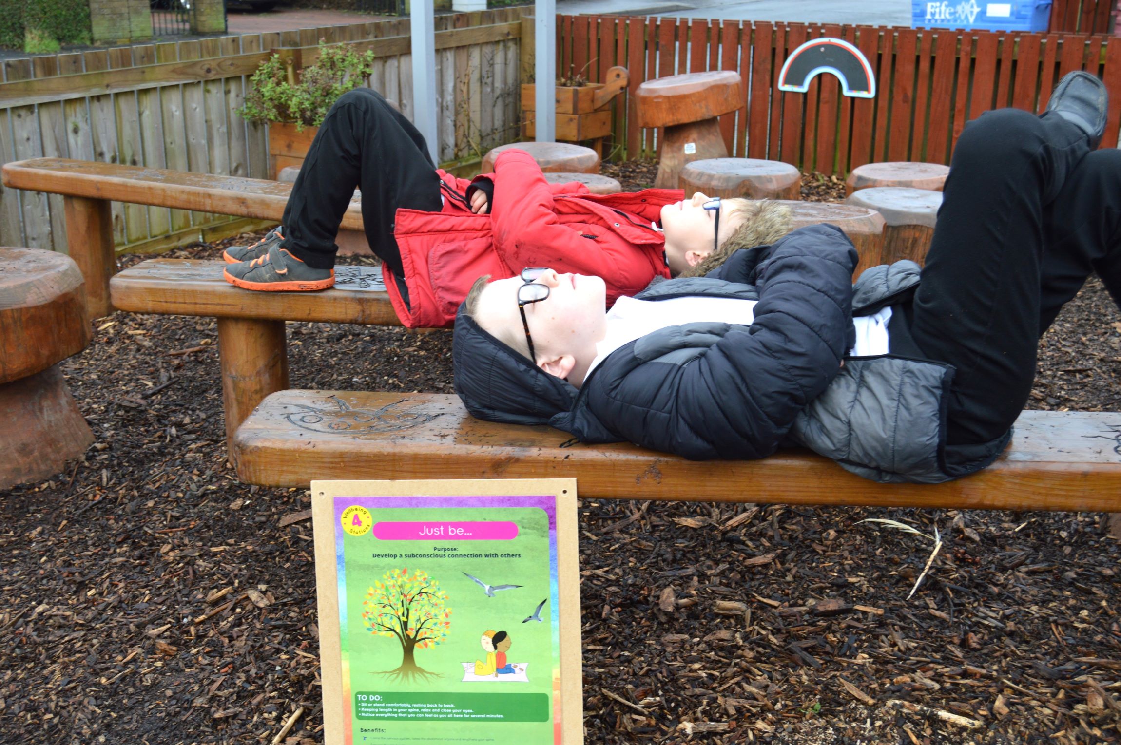 Lying down on bench