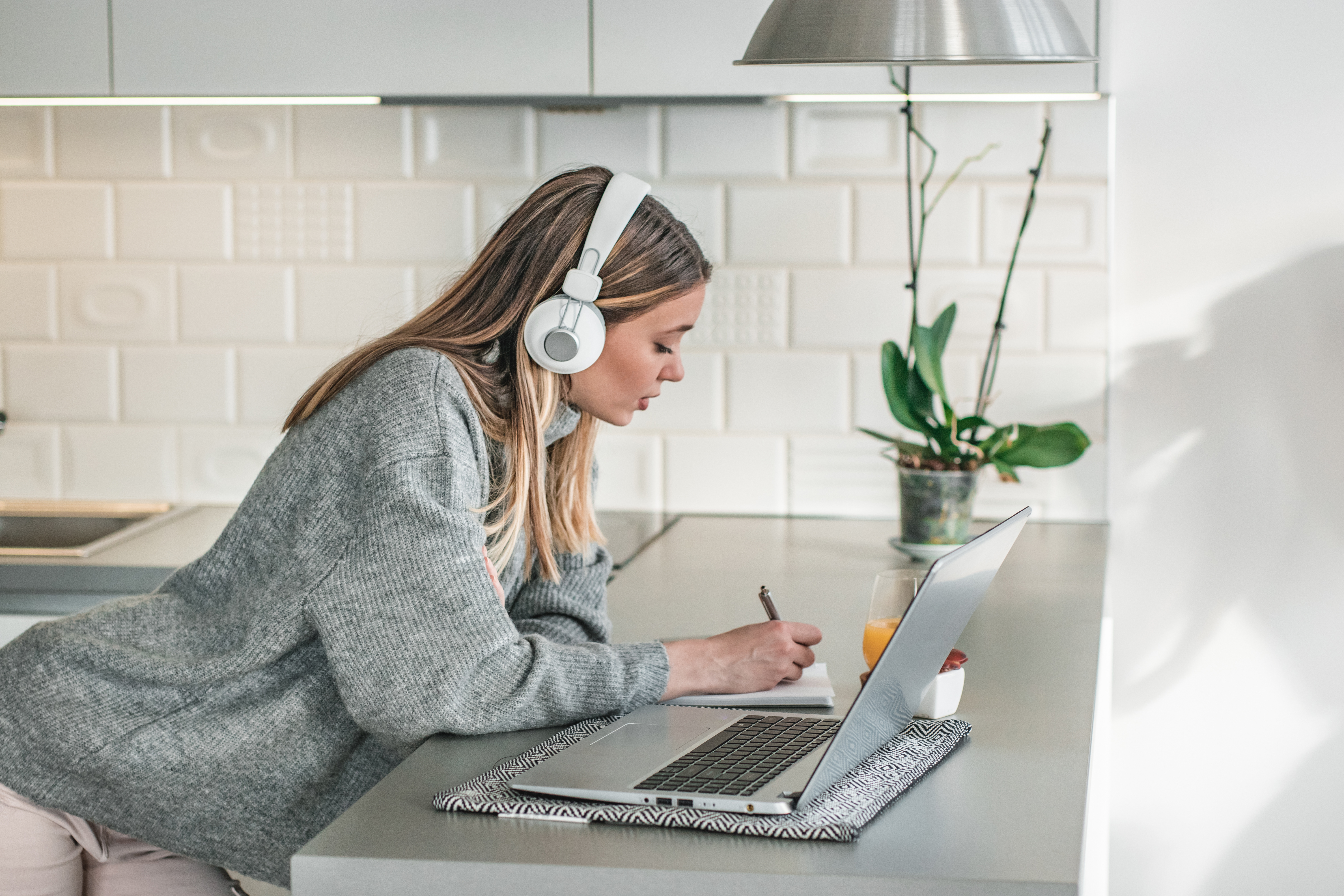 Personal growth and transformation – A focused individual journaling and reflecting, embracing the Energy of Realization journey.