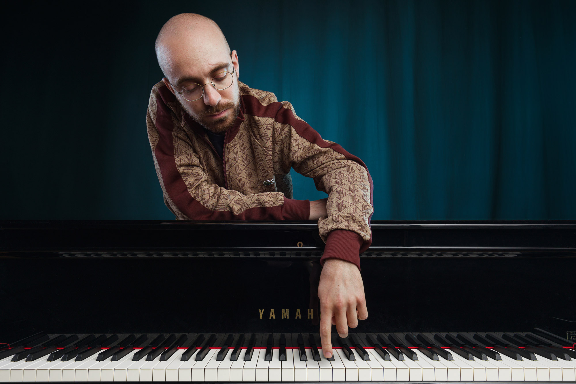 Costantino Carrara, pianist and arranger with over 150 million YouTube views and 50,000+ sheet music downloads.