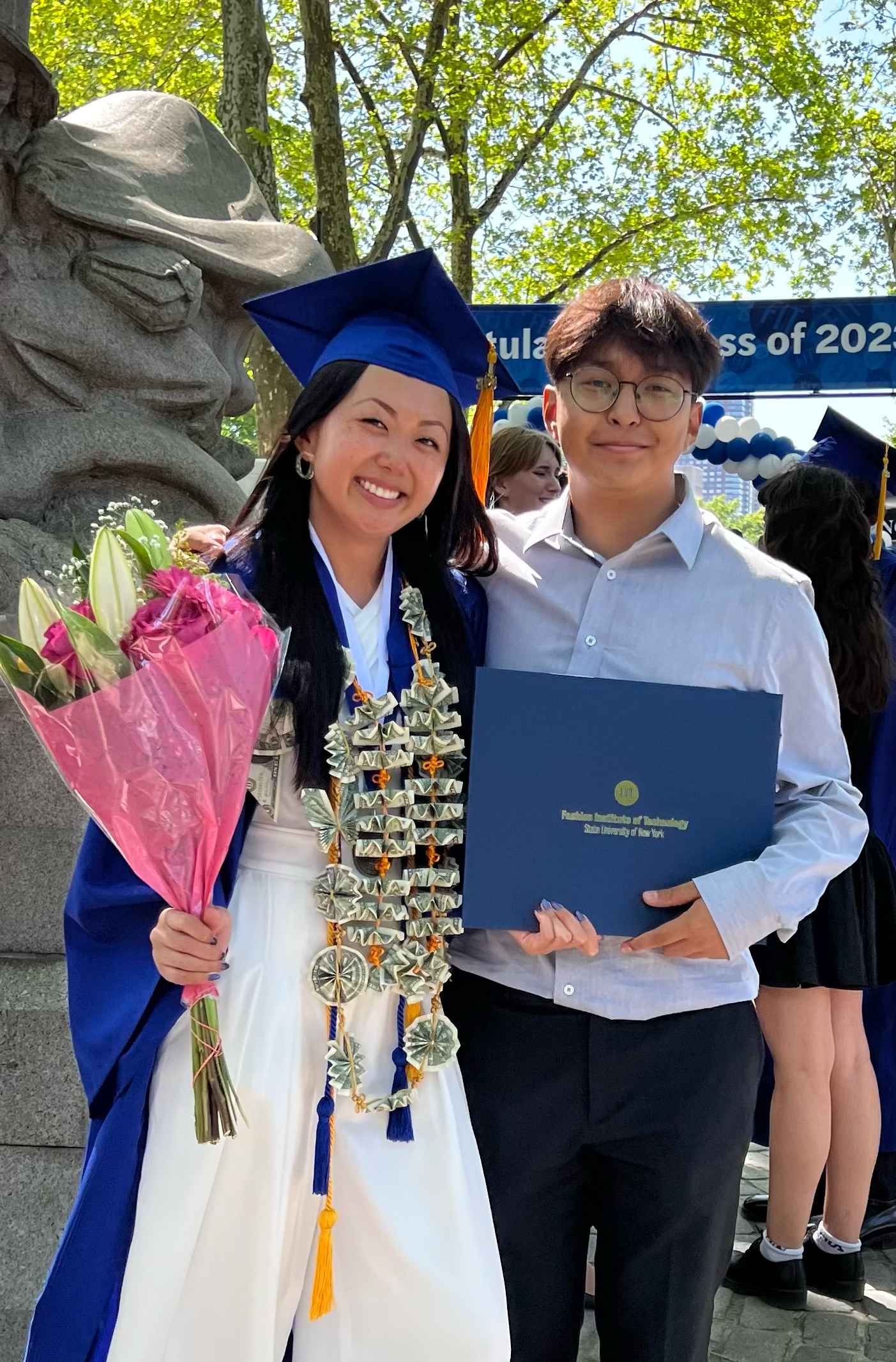 Photo of Michelle and Marco at Michelle's graduation from FIT