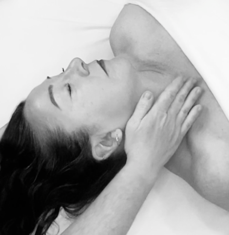 female receiving therapeutic neck massage