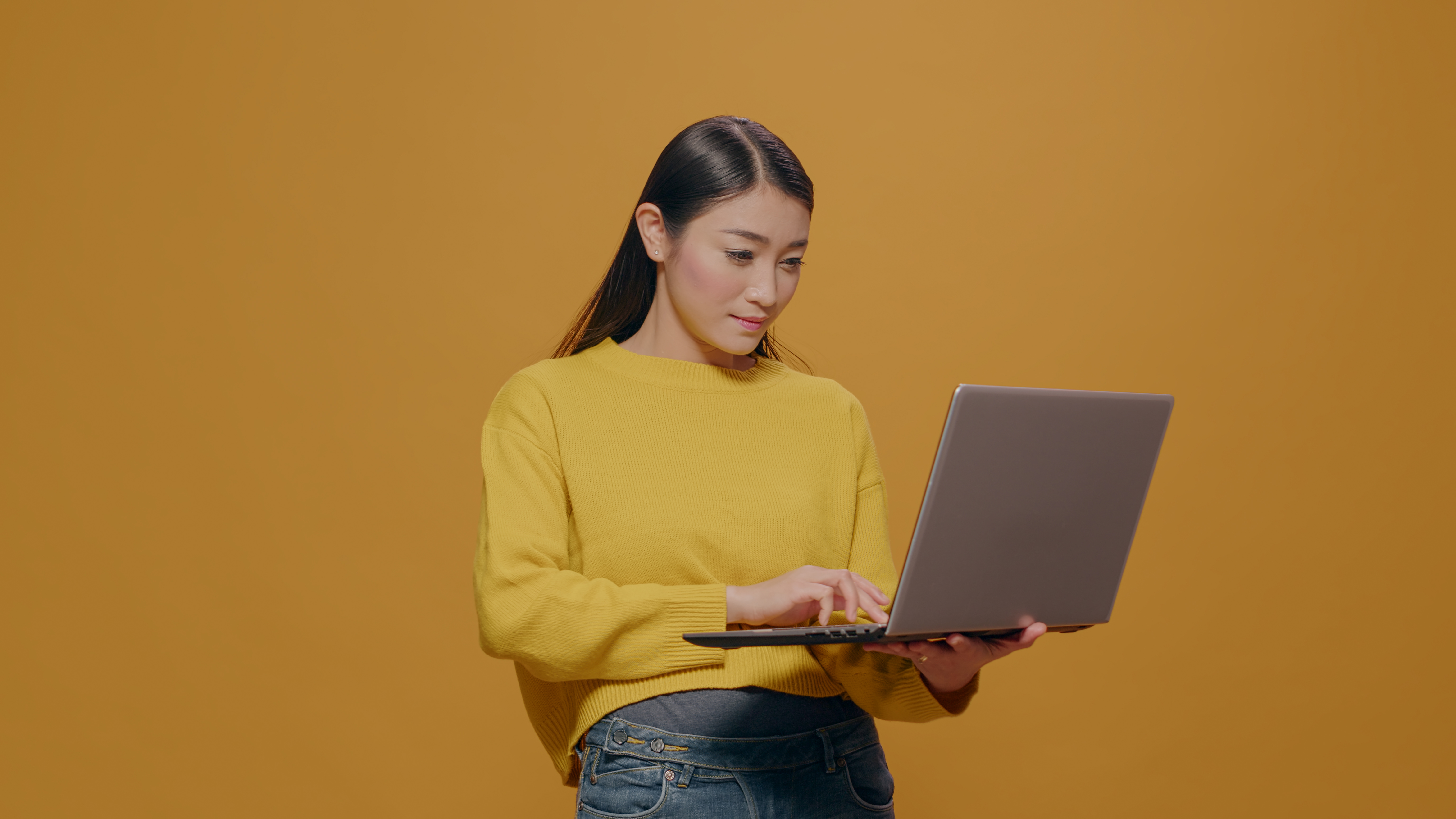 Young person using a laptop 