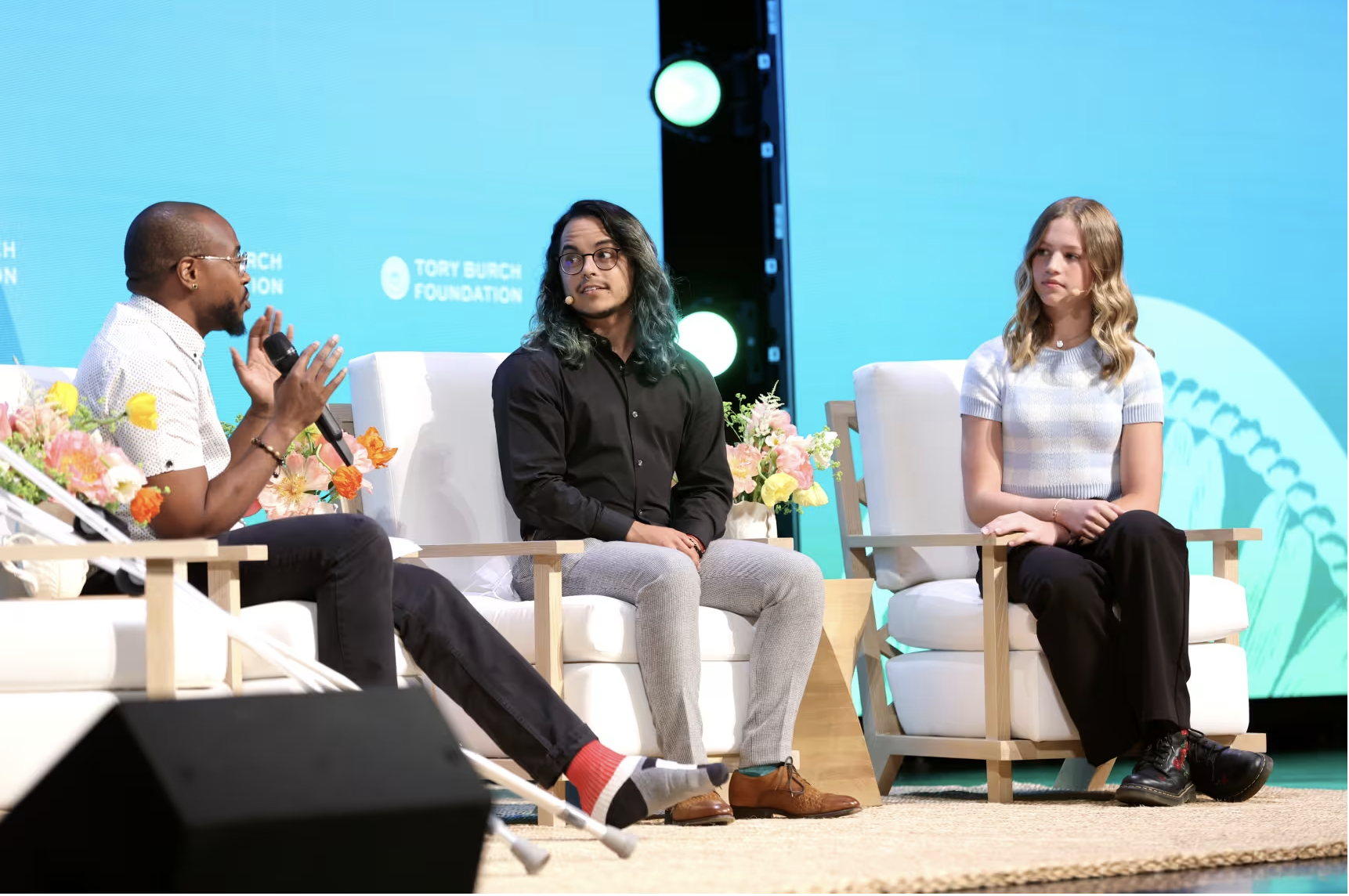 Professional speaker delivering confident presentation on stage