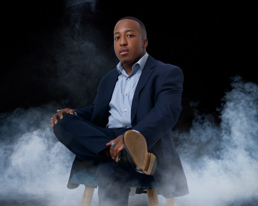 Willie The OWL sitting in a chair.