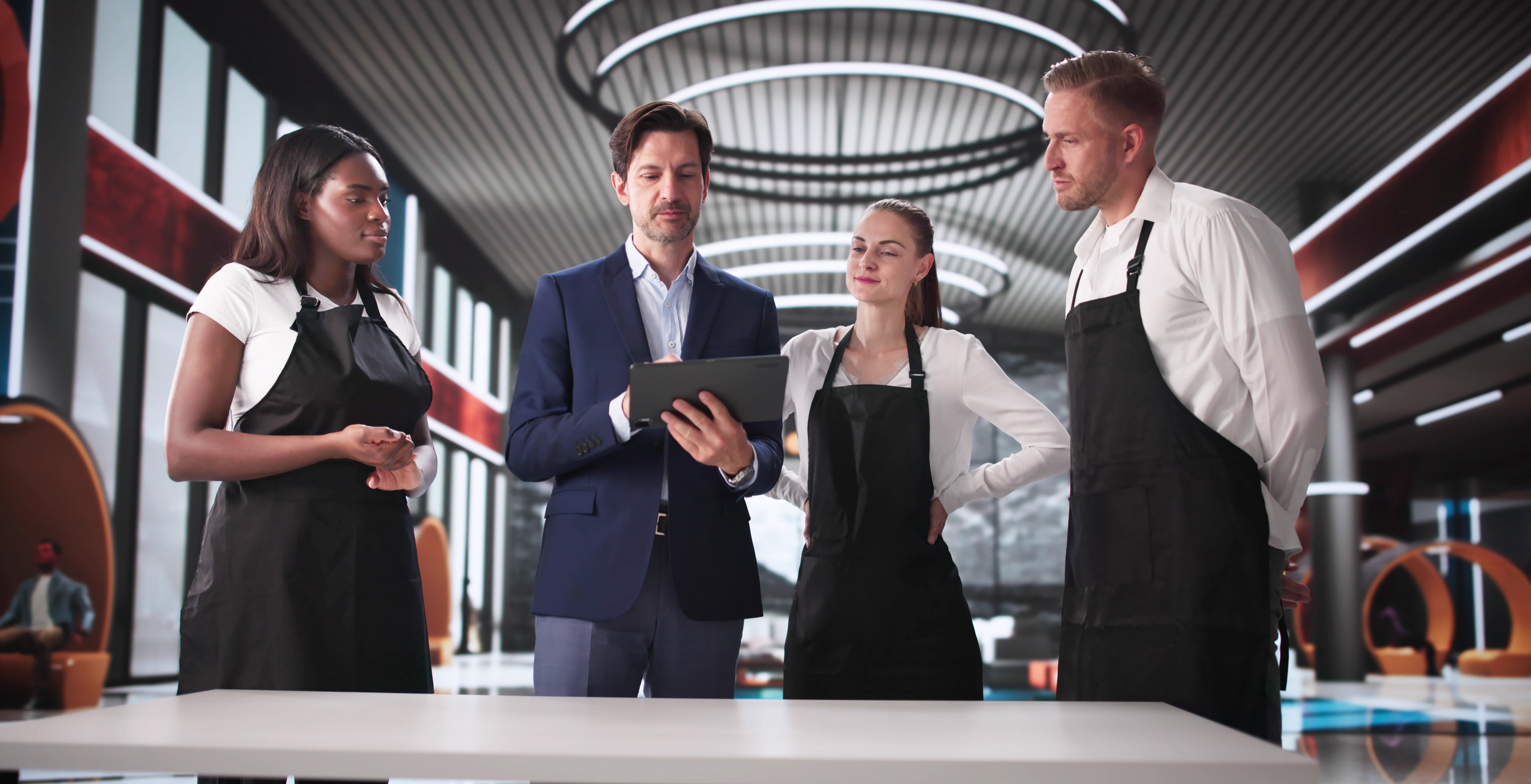 Hospitality manager leading a team briefing with restaurant staff in a professional service environment