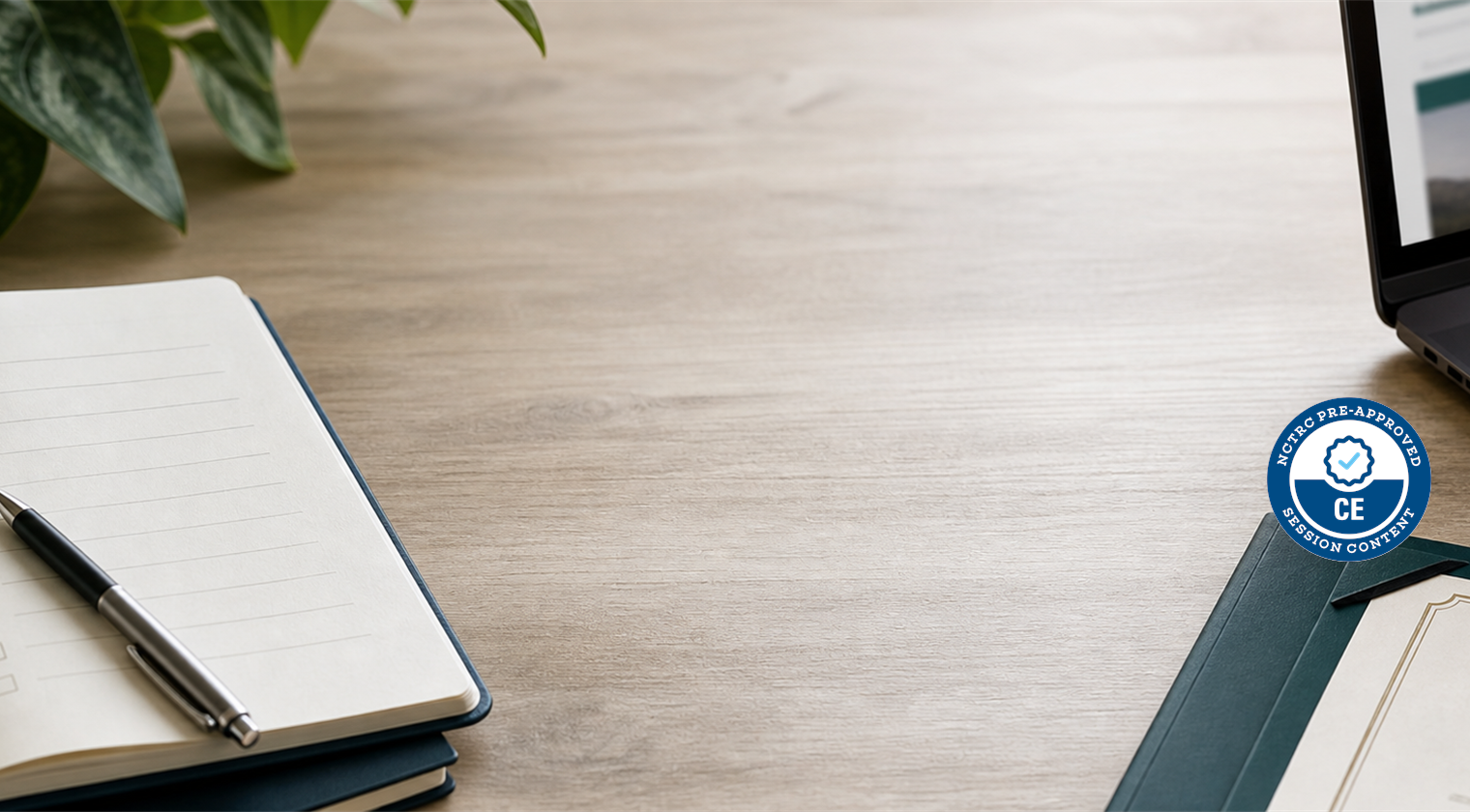 Laptop and notebook used to review continuing-education options