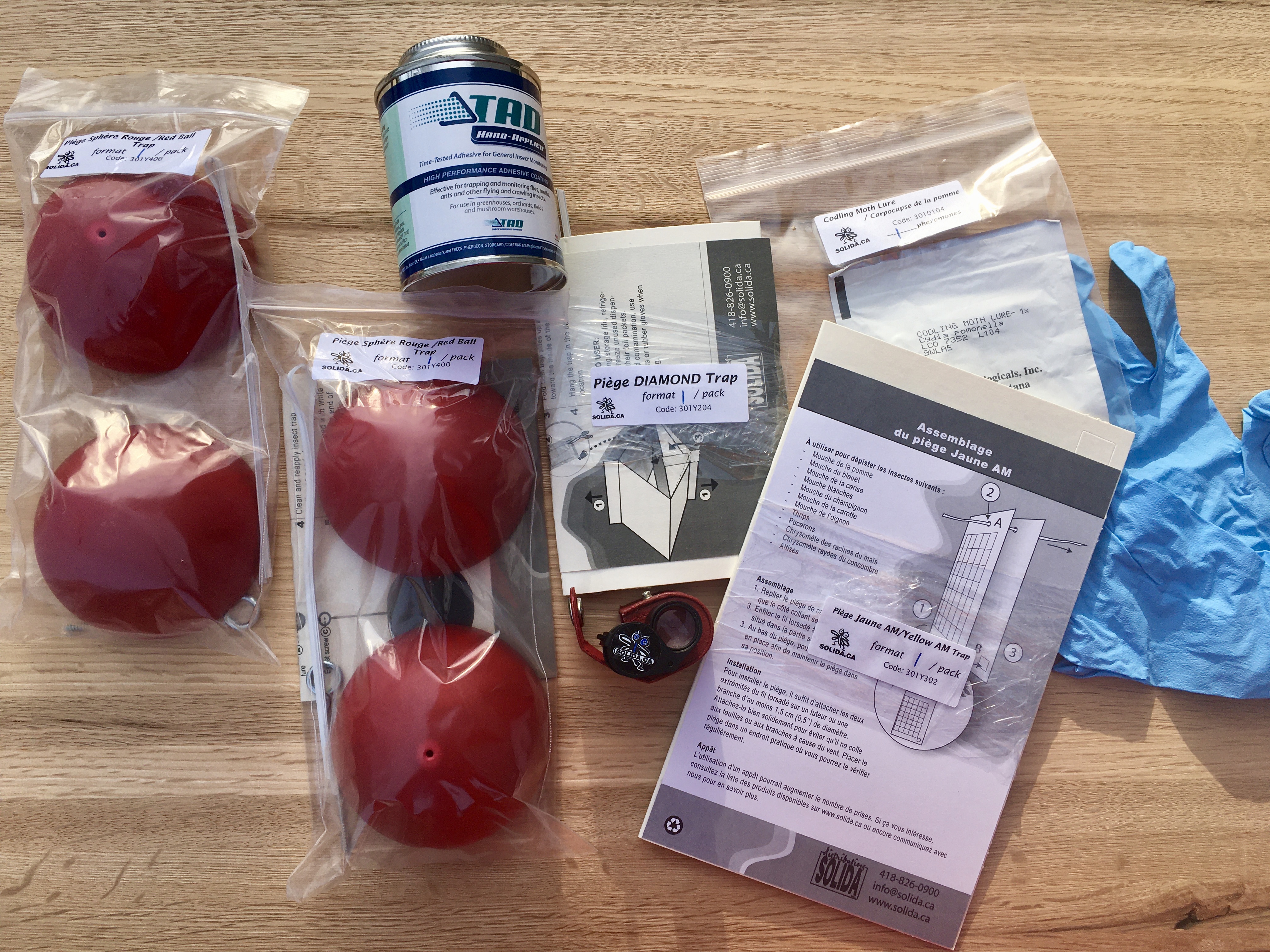 Apple Tree Trap Starter Kit Products include two spherical traps, Tangletrap coating, a diamond trap, a yellow sticky card, a coddling moth lure, disposable gloves and a professional hand lens. Apple Tree Trap Starter Kit Products include two spherical traps, Tangletrap coating, a diamond trap, a yellow sticky card, a coddling moth lure, disposable gloves and a professional hand lens.