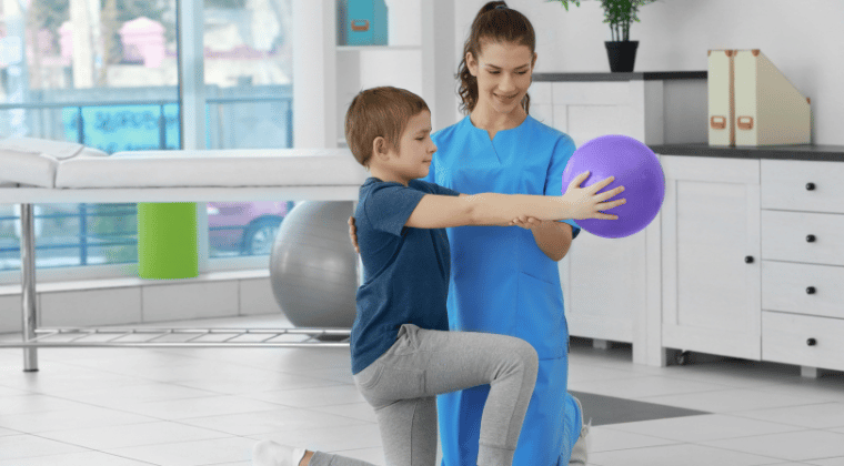 Physiotherapist and child