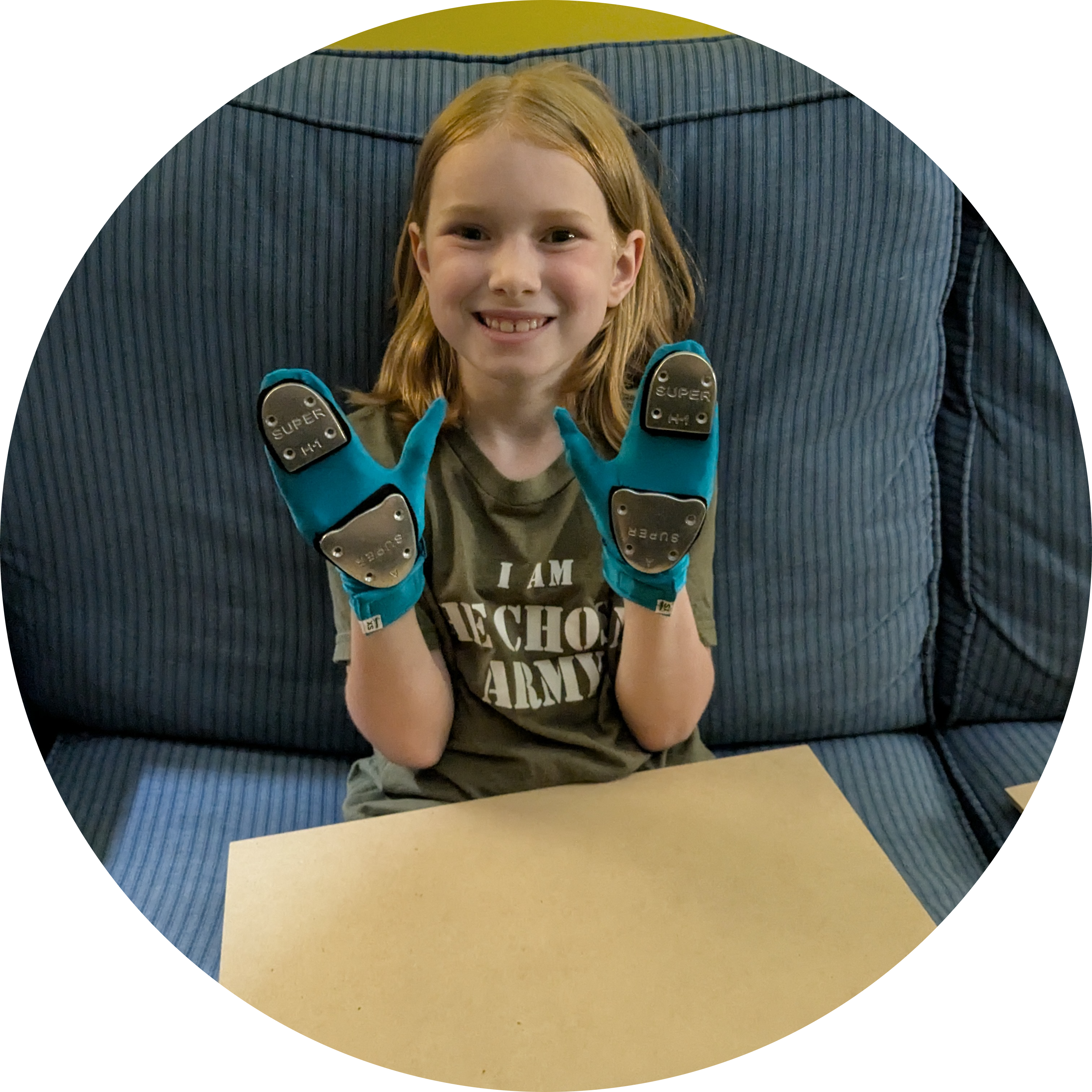 Smiling young seated hand tap student.