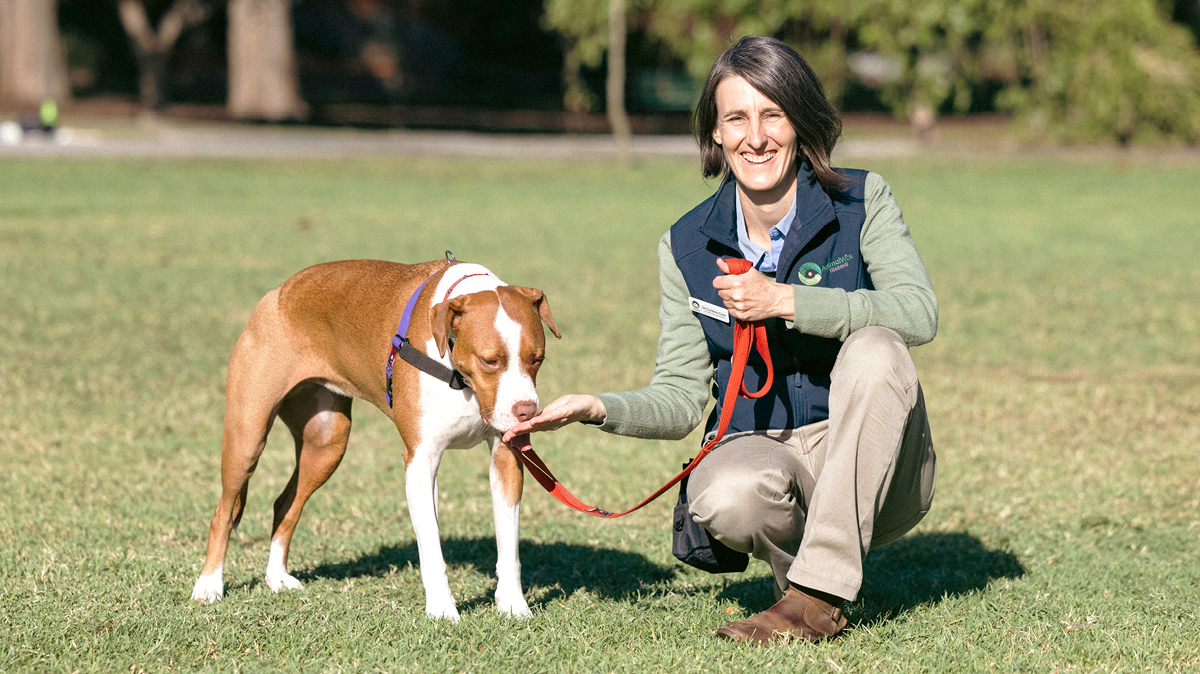 Dr_Caroline_kneeling_with_dog_on-a-lead